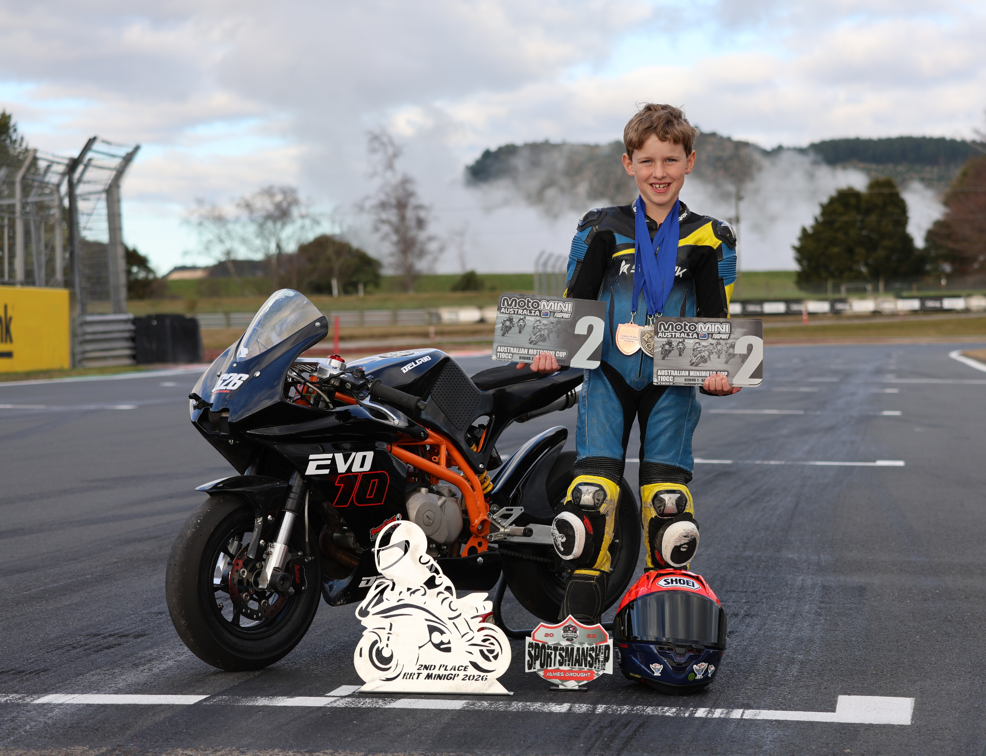 James Drought with his trophies trackside