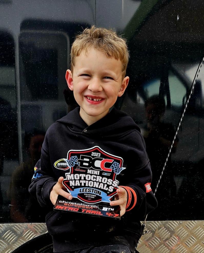 James Drought with his BCC Mini Motocross Nationals trophy at Leeston, 2023